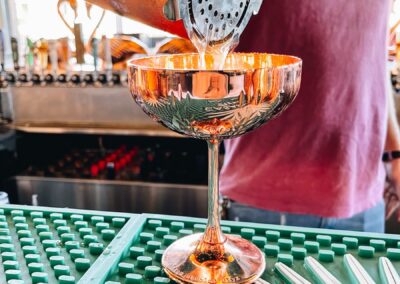 Bartender pours drink